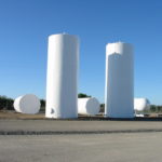 Large agricultural tanks sandblasting in Yuba City California that we then painted